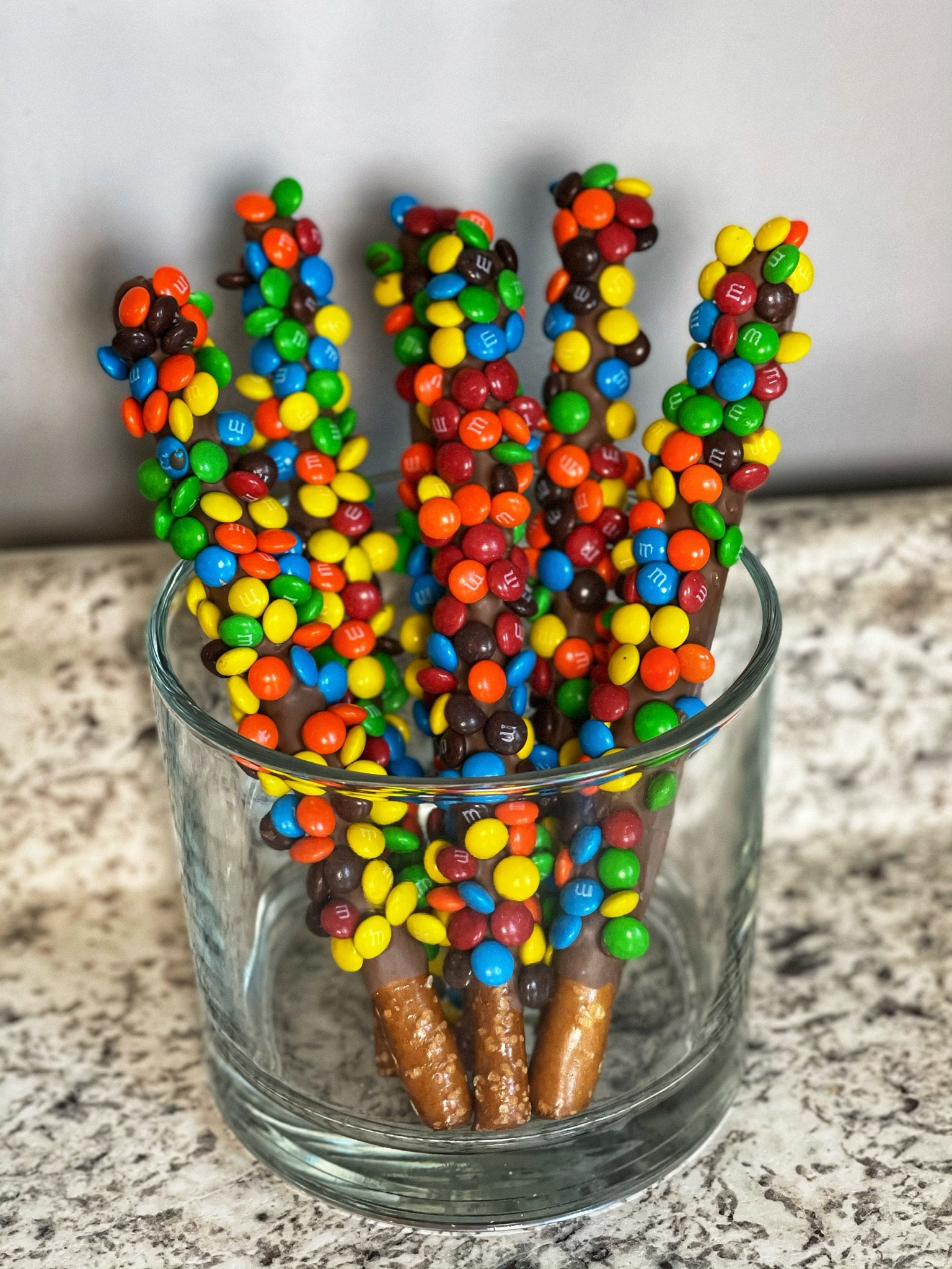 Milk Chocolate Dipped Rainbow Mini M&M Pretzel Rod  Manchester Craft  Market - Shop Local at the Mall of New Hampshire